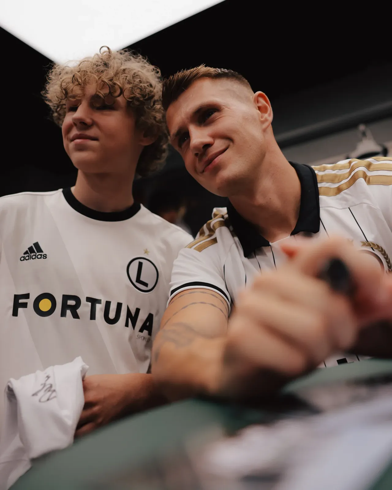 Spotkanie kibiców z piłkarzami Legii w FanStore